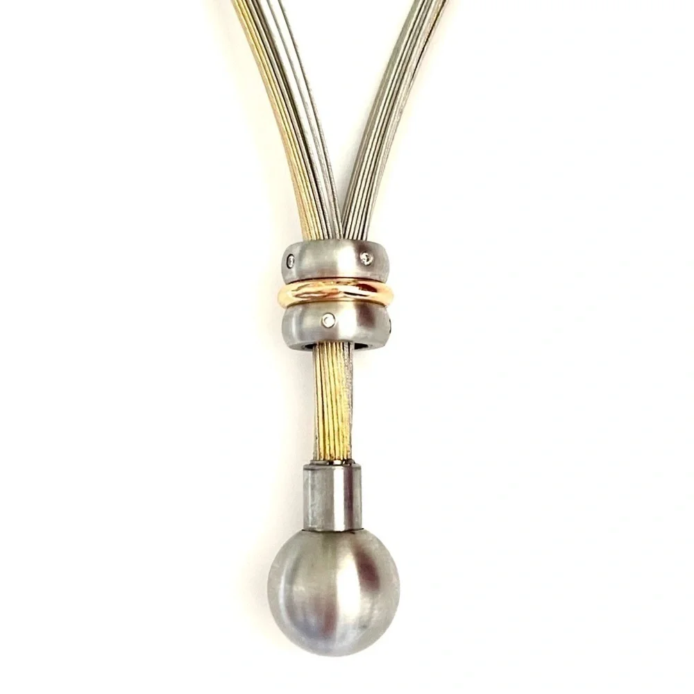 TeNo Genuine Diamond, Stainless Steel, & Gold Necklace!